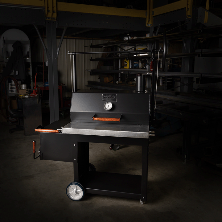 1000 Series Original Braten Wood Fired grill with dark Engelbrecht shop background