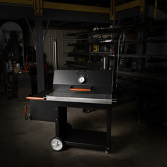 1000 Series Original Braten Wood Fired grill with dark Engelbrecht shop background