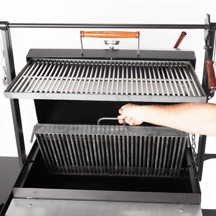 1000 Series Grill on white background with lid raised and lower grate lifted