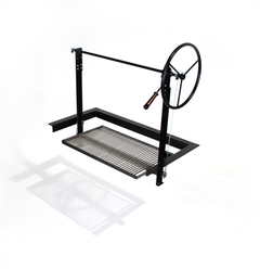 angled view of parilla grill with stainless grate