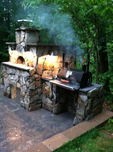 Customer installed 1000 Series Braten Masonry grill cooking on patio